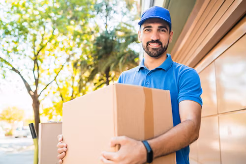 Courier delivering parcel to customer doorstep safely